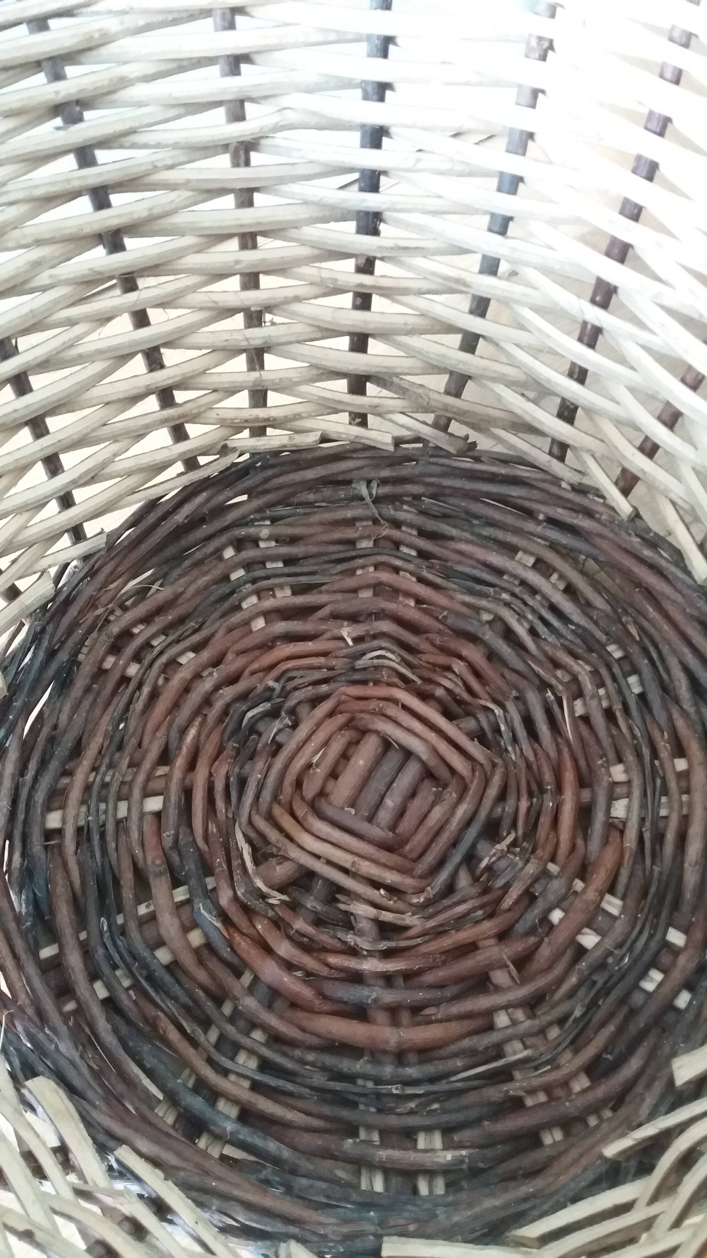 Woven wicker basket with handle