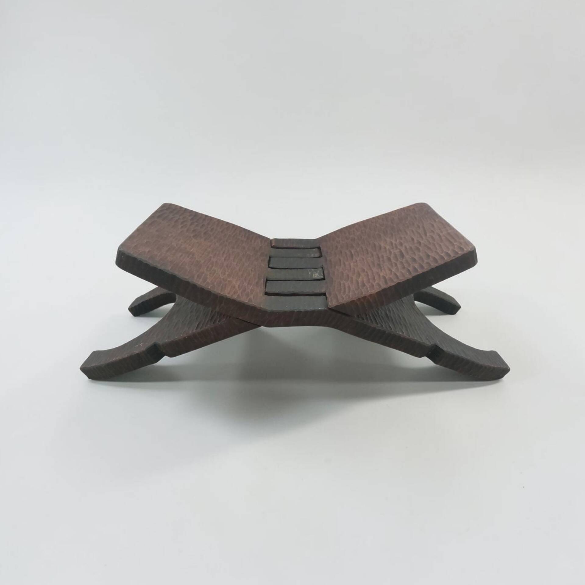 Small Mexican footrest attributed to Don Shoemaker.