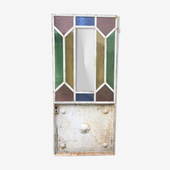 Porte métal et verre multicolore d'hotel particulier