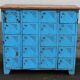 Old blue metal locker with wooden top