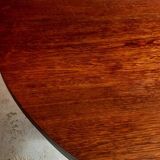 Table ronde vintage extensible en bois.