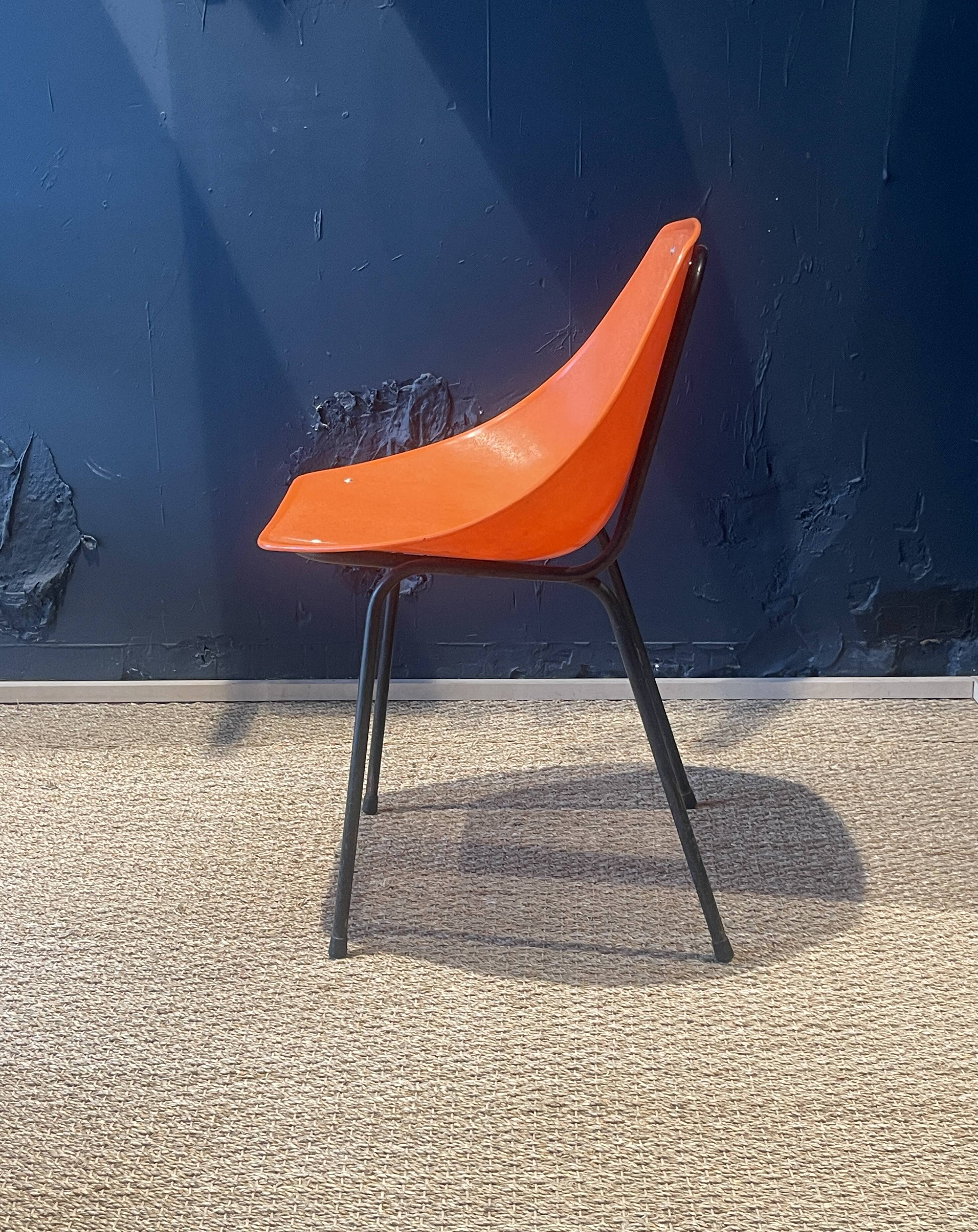 Set of 12 orange Guariche chairs