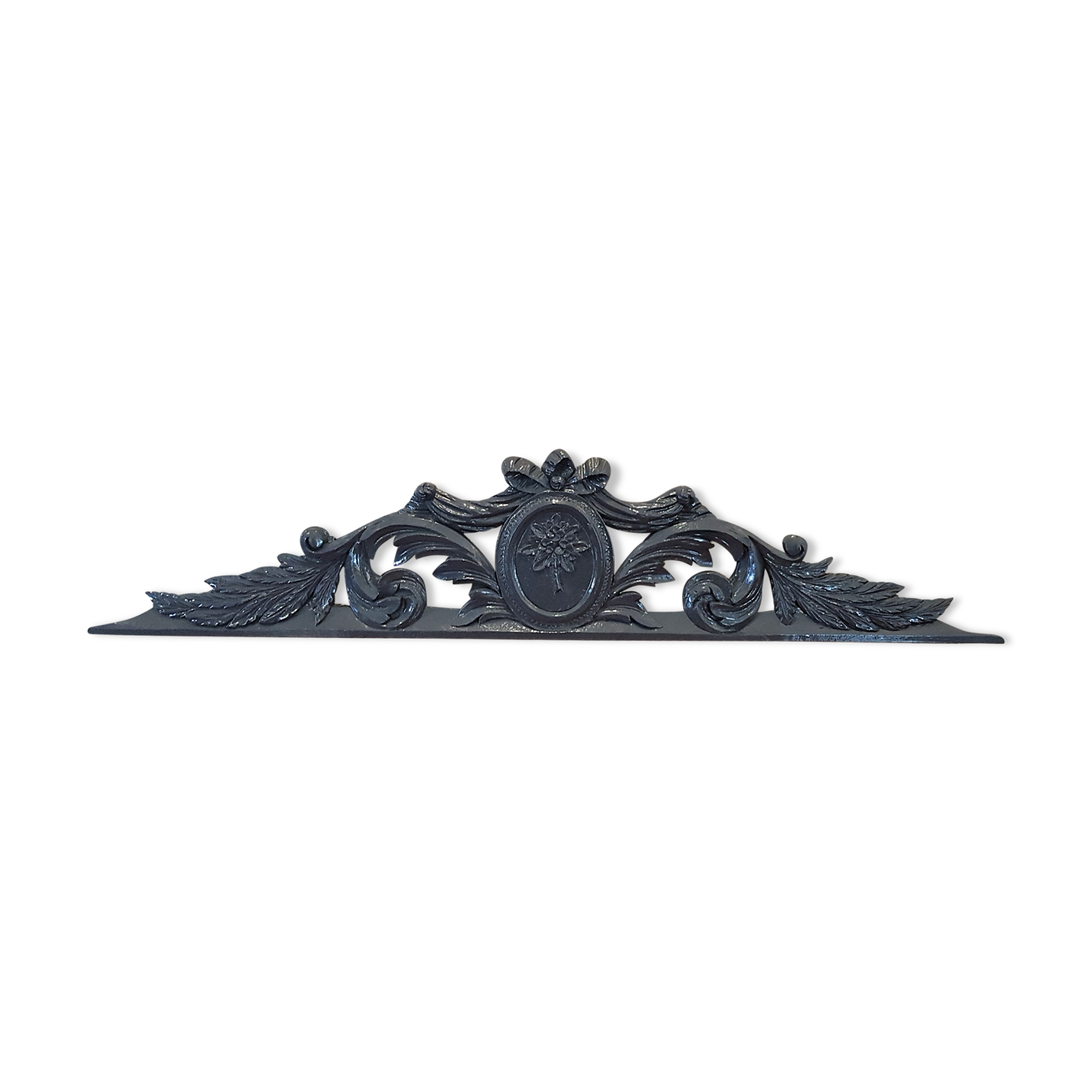 Old carved wooden pediment