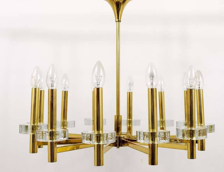 Brass and glass disc pendant light in the style of Gaetano Sciolari, mid-century, Italy, 1970s.