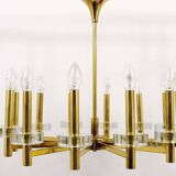 Brass and glass disc pendant light in the style of Gaetano Sciolari, mid-century, Italy, 1970s.