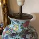 Large foot of enamel earthenware lamp with floral motifs (XX°)