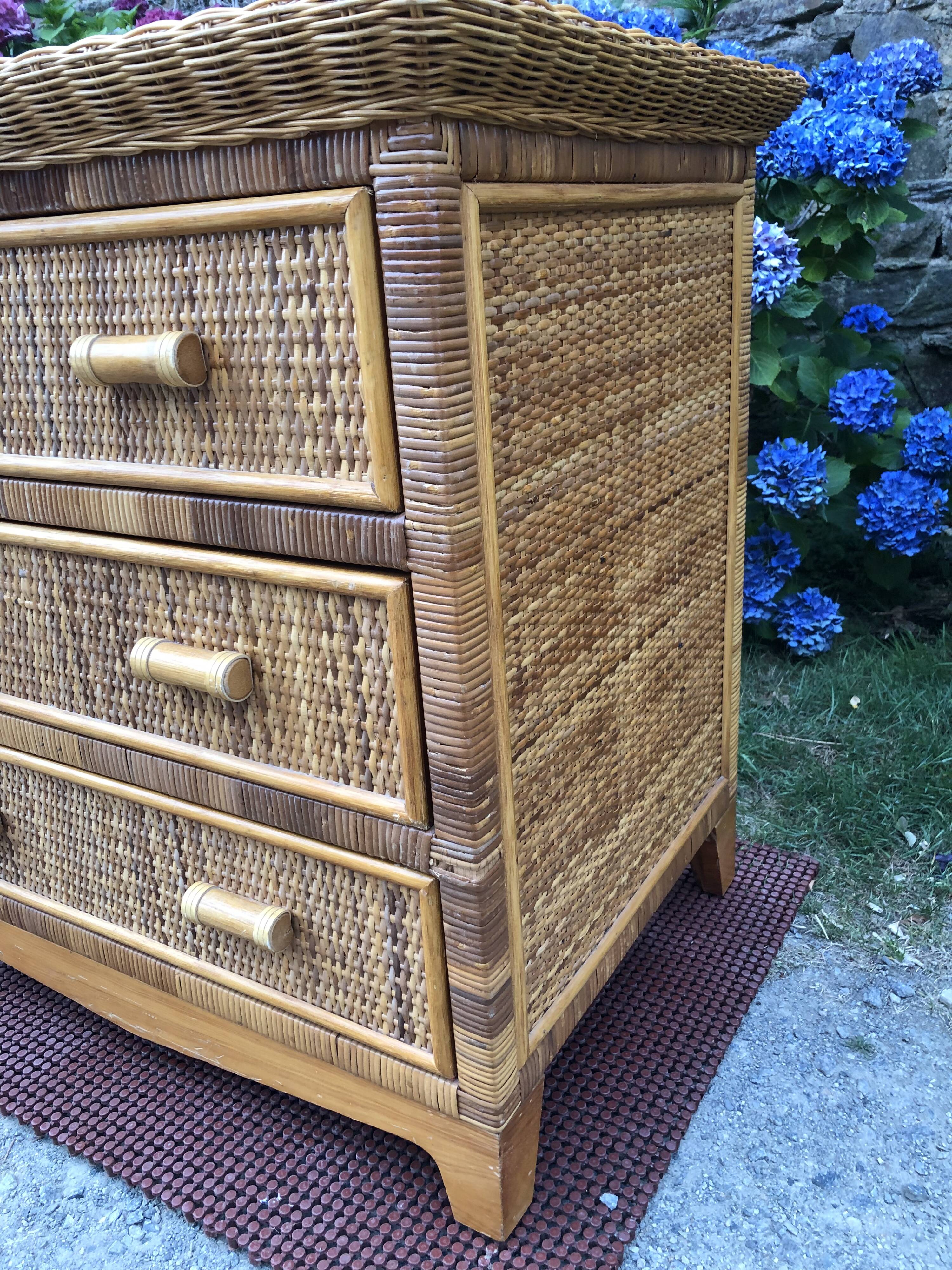 Vintage rattan chest of drawers has 3 drawers.