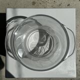 Glass ice or champagne bucket with stylized petal patterns
