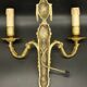 Pair of ram's head wall sconces in gilded bronze, Louis XVI style, 19th century.