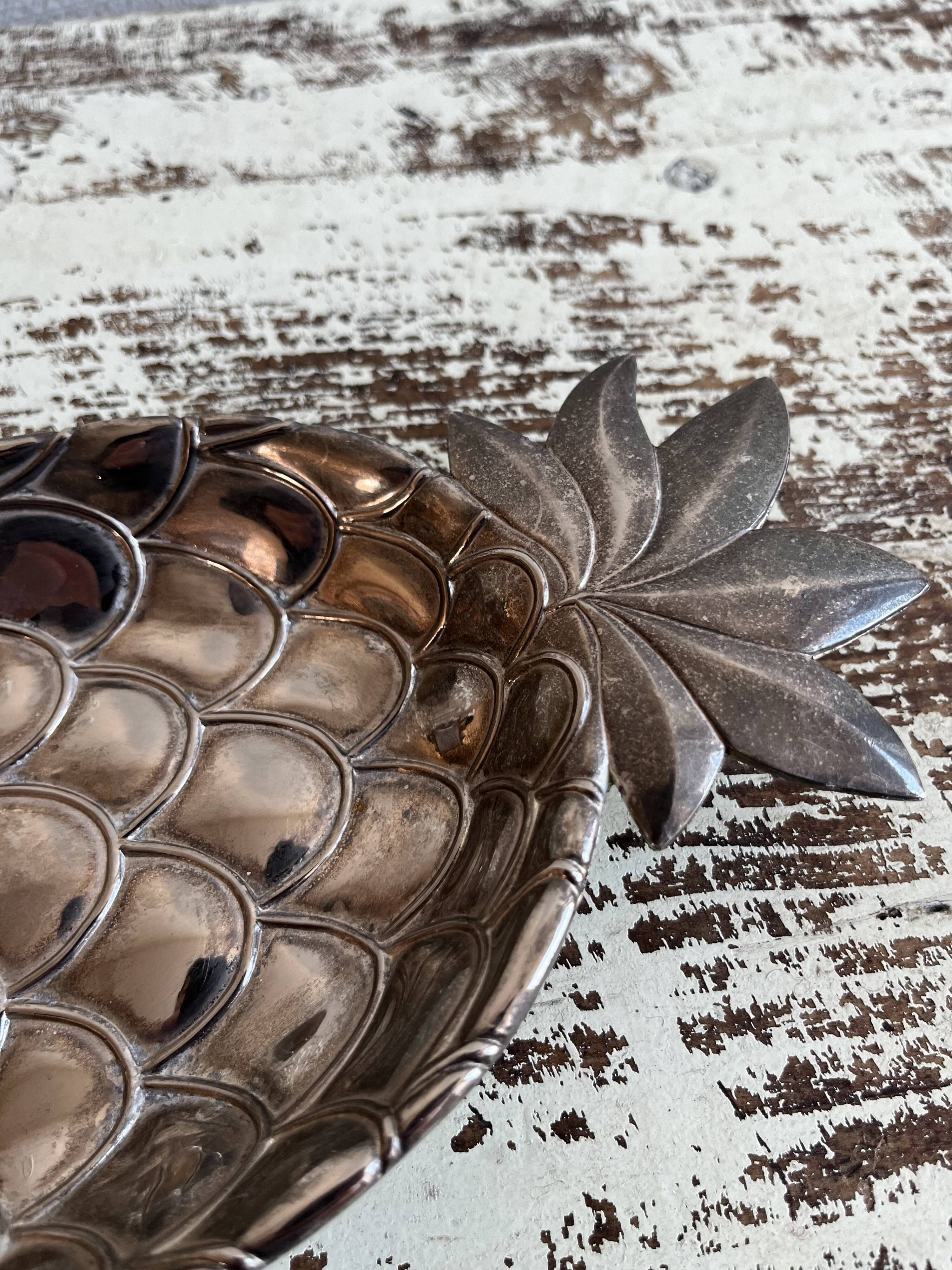 Silver-plated pineapple pocket emptier