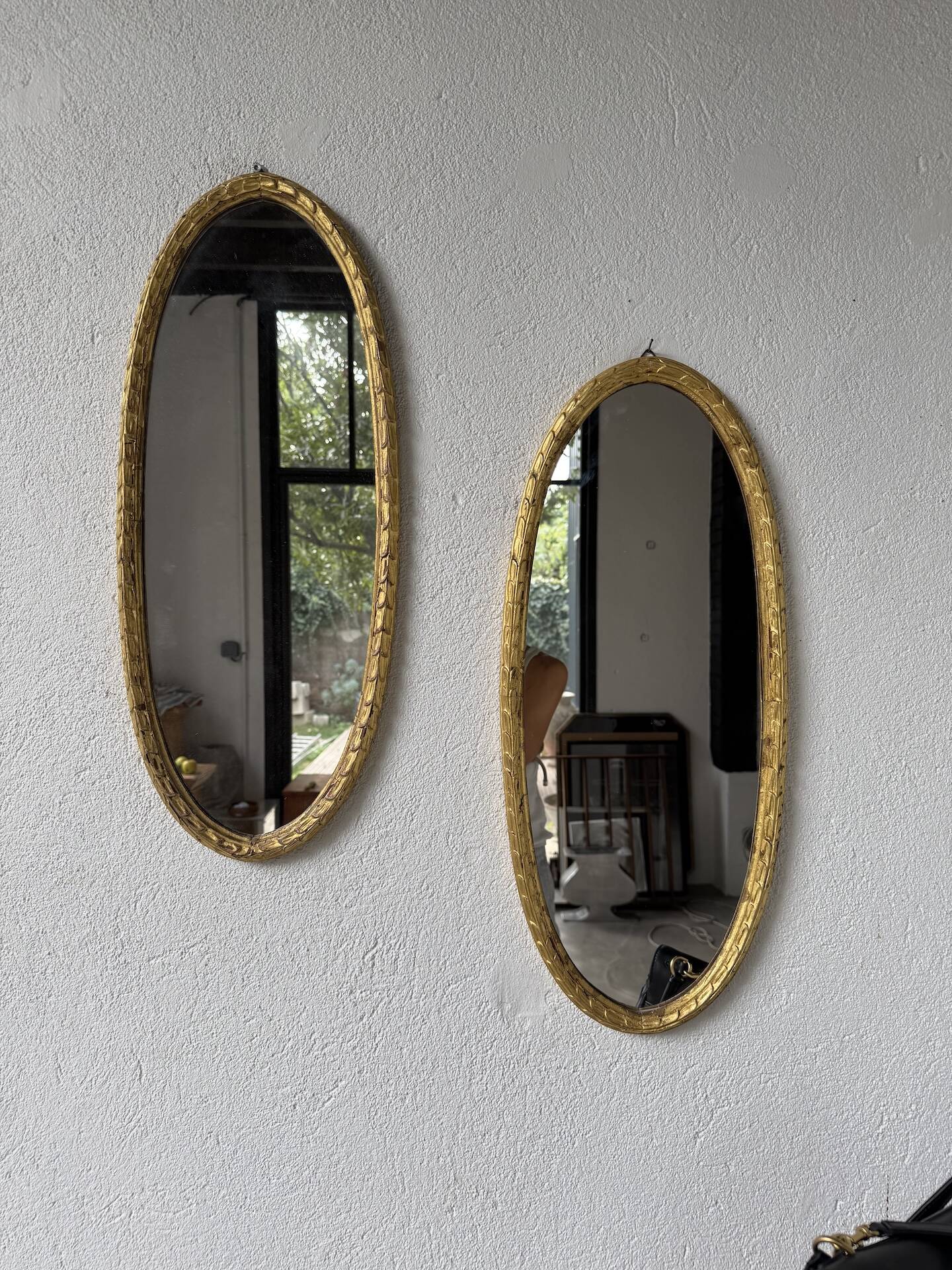 Pair of oval mirrors 1900 gilded stucco