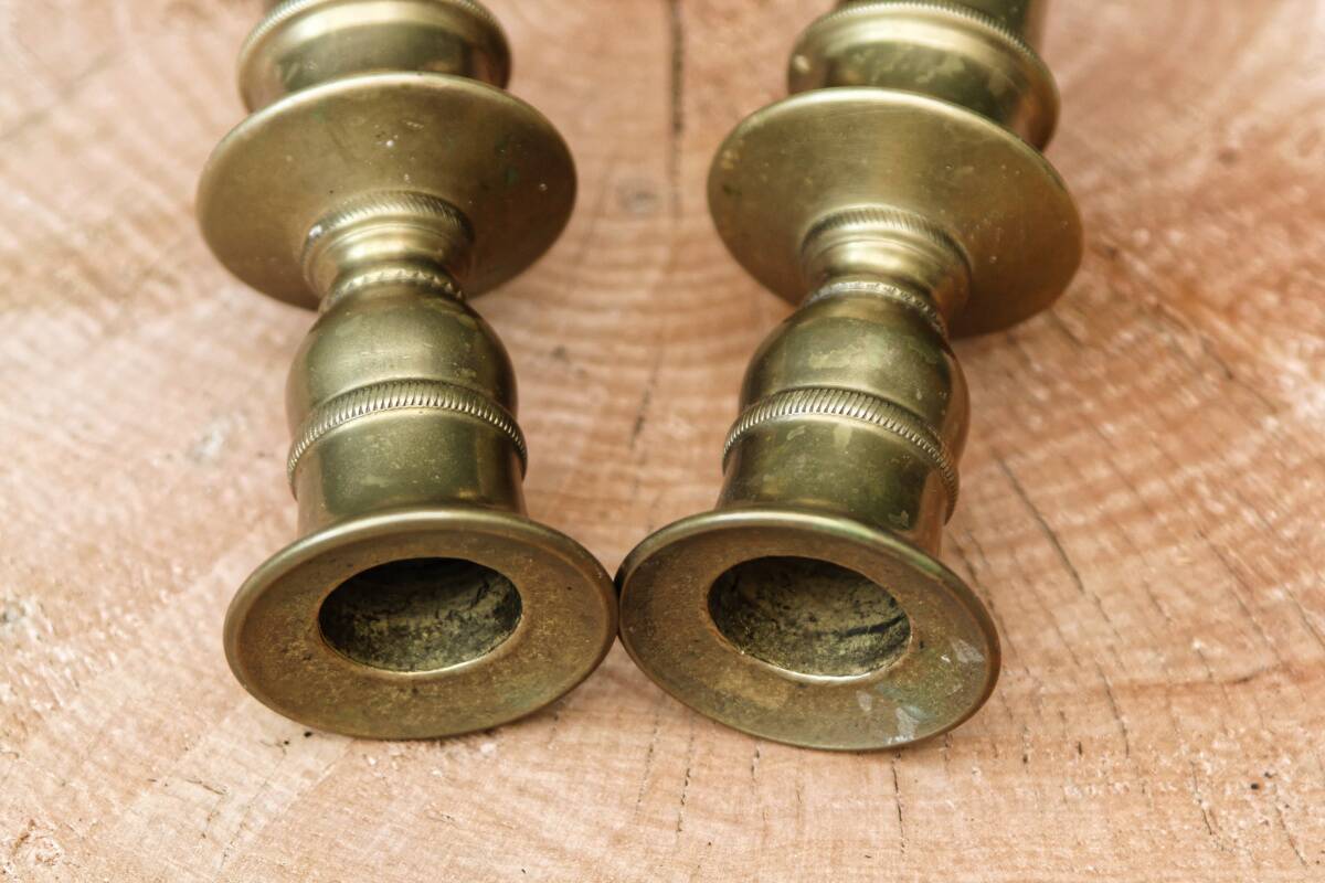 Pair of guilloché bronze candlesticks