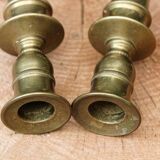 Pair of guilloché bronze candlesticks