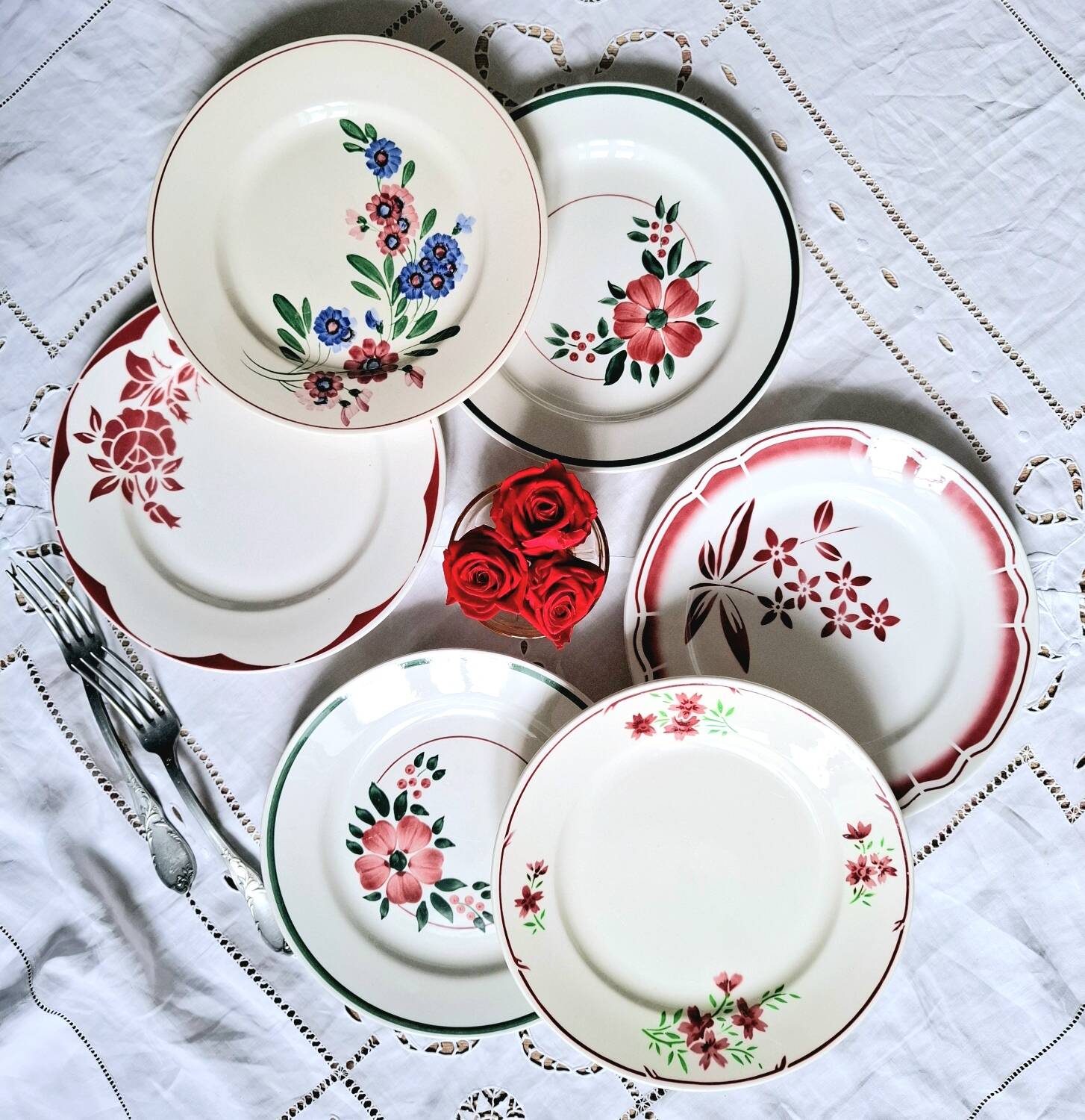 Old mismatched earthenware dinner plates