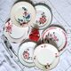 Old mismatched earthenware dinner plates