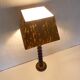 turned wooden lamp with spool base and vintage copper shade