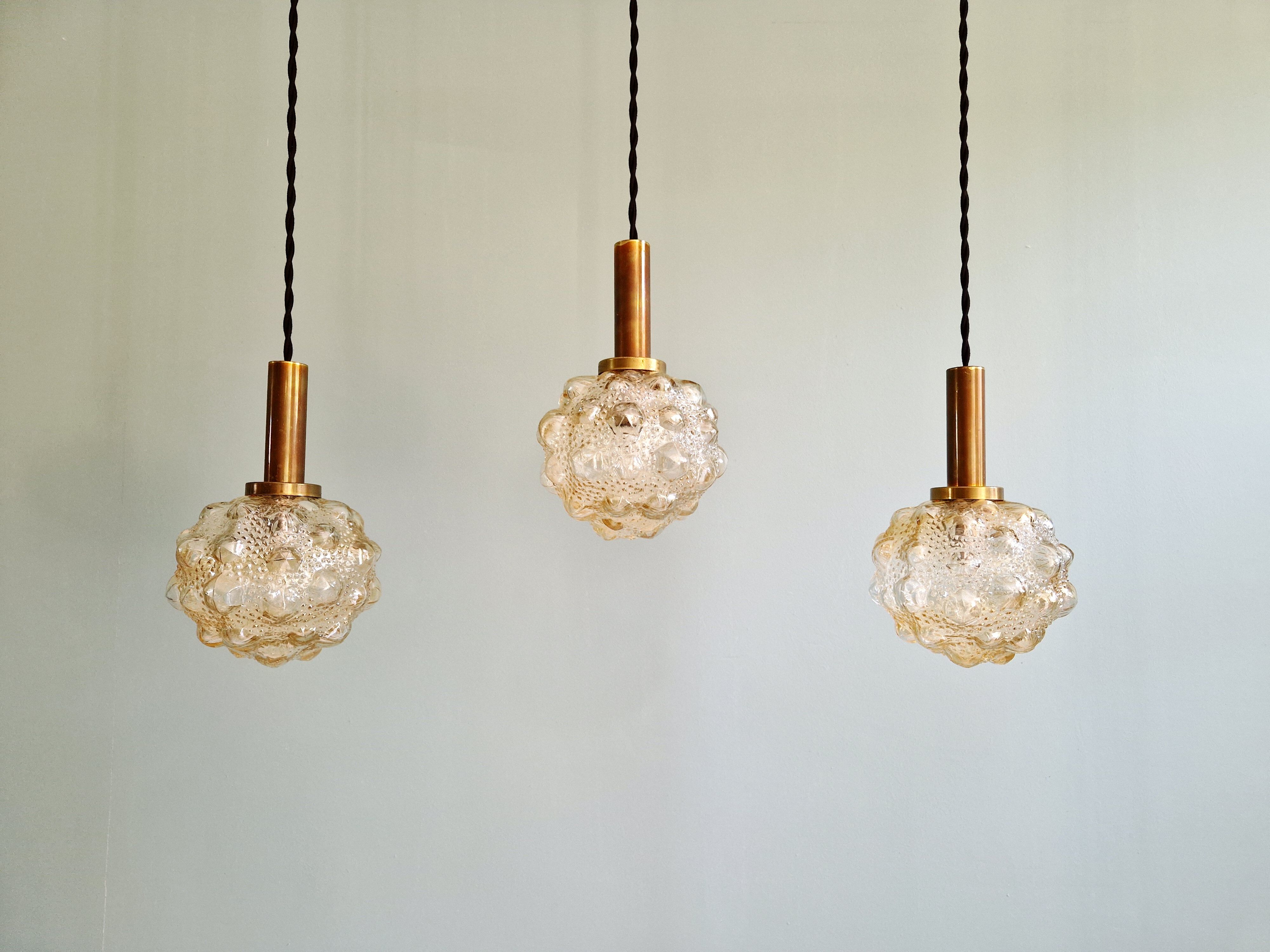 Amber bubble glass suspension trio, design H. Tynell, 1970