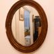 Old art deco oval wooden mirror
