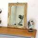Richly carved antique gilded mirror