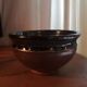 Enamelled ceramic cup