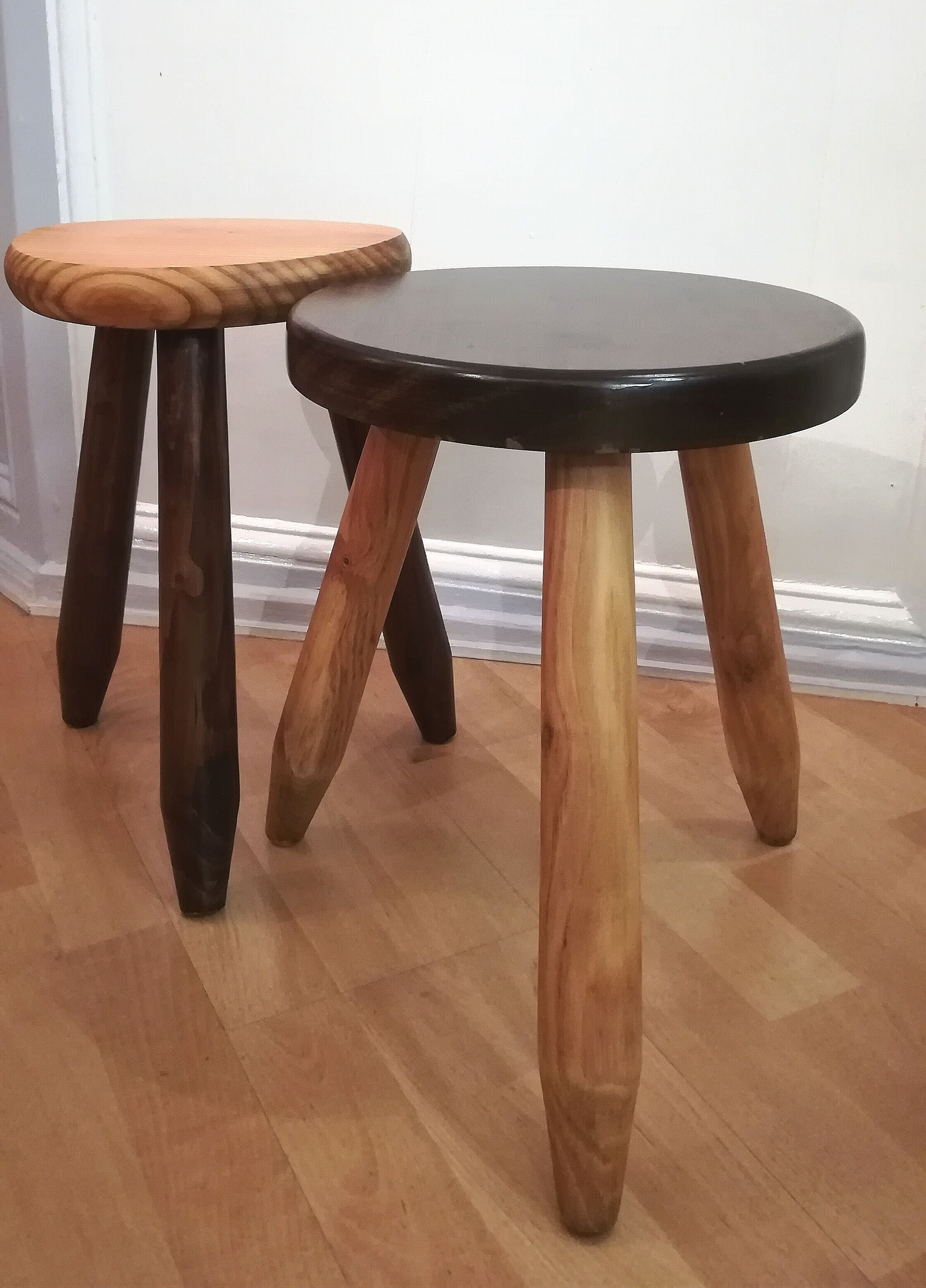 Two tripod stools wooden feet pencils