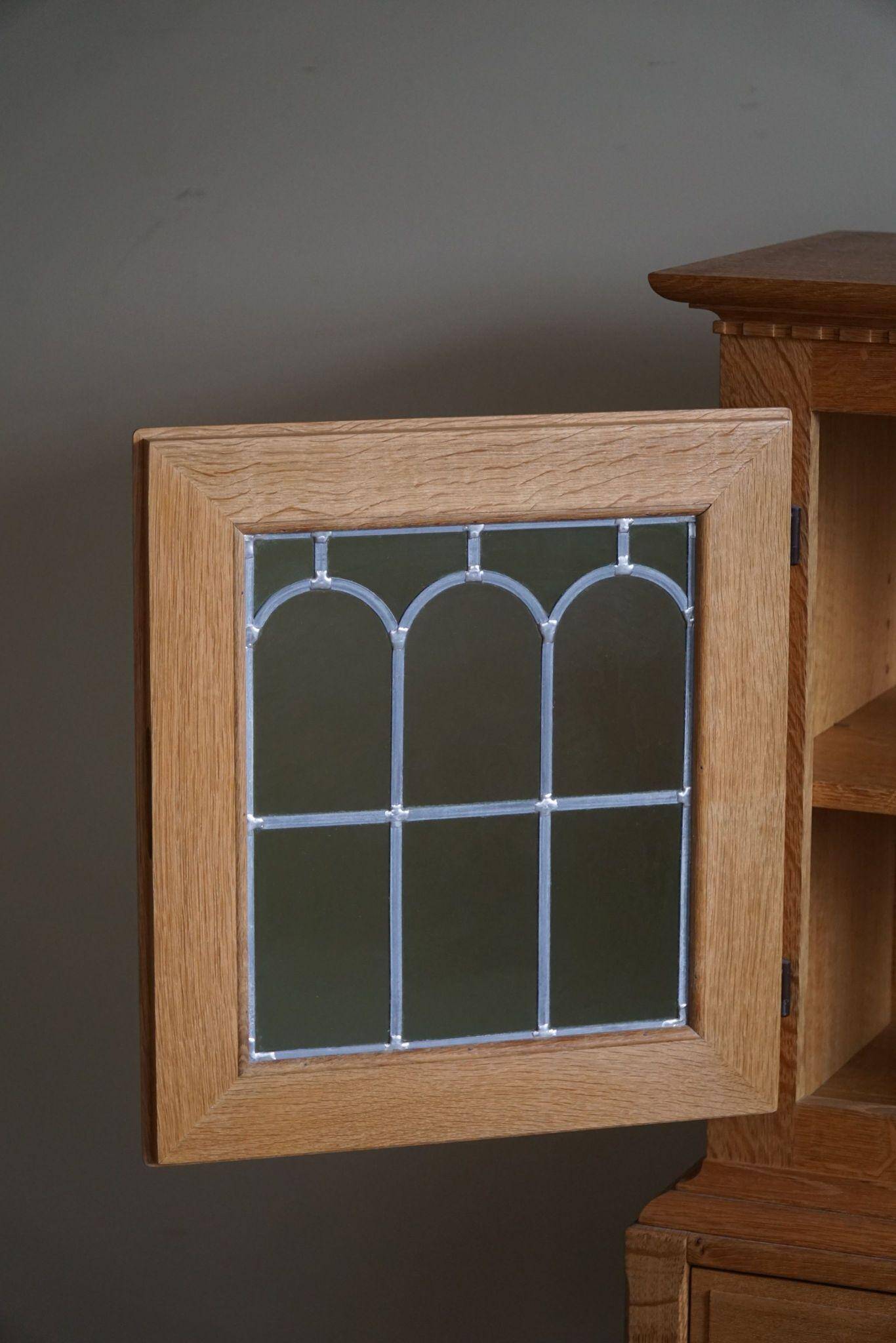 20th-century solid oak display cabinet with a glass front, by a Danish cabinetmaker.
