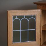 20th-century solid oak display cabinet with a glass front, by a Danish cabinetmaker.