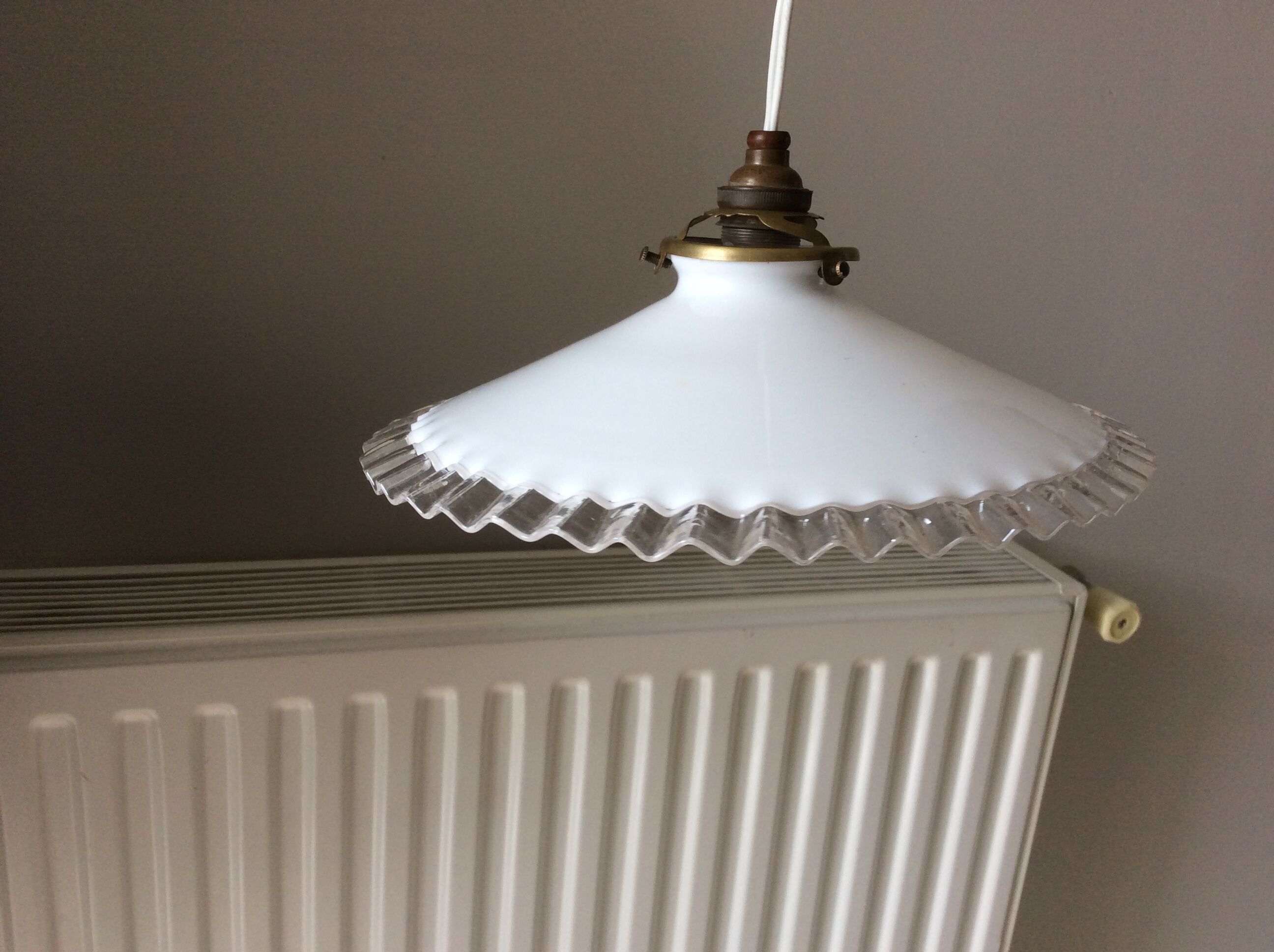 Old suspension in dented opaline