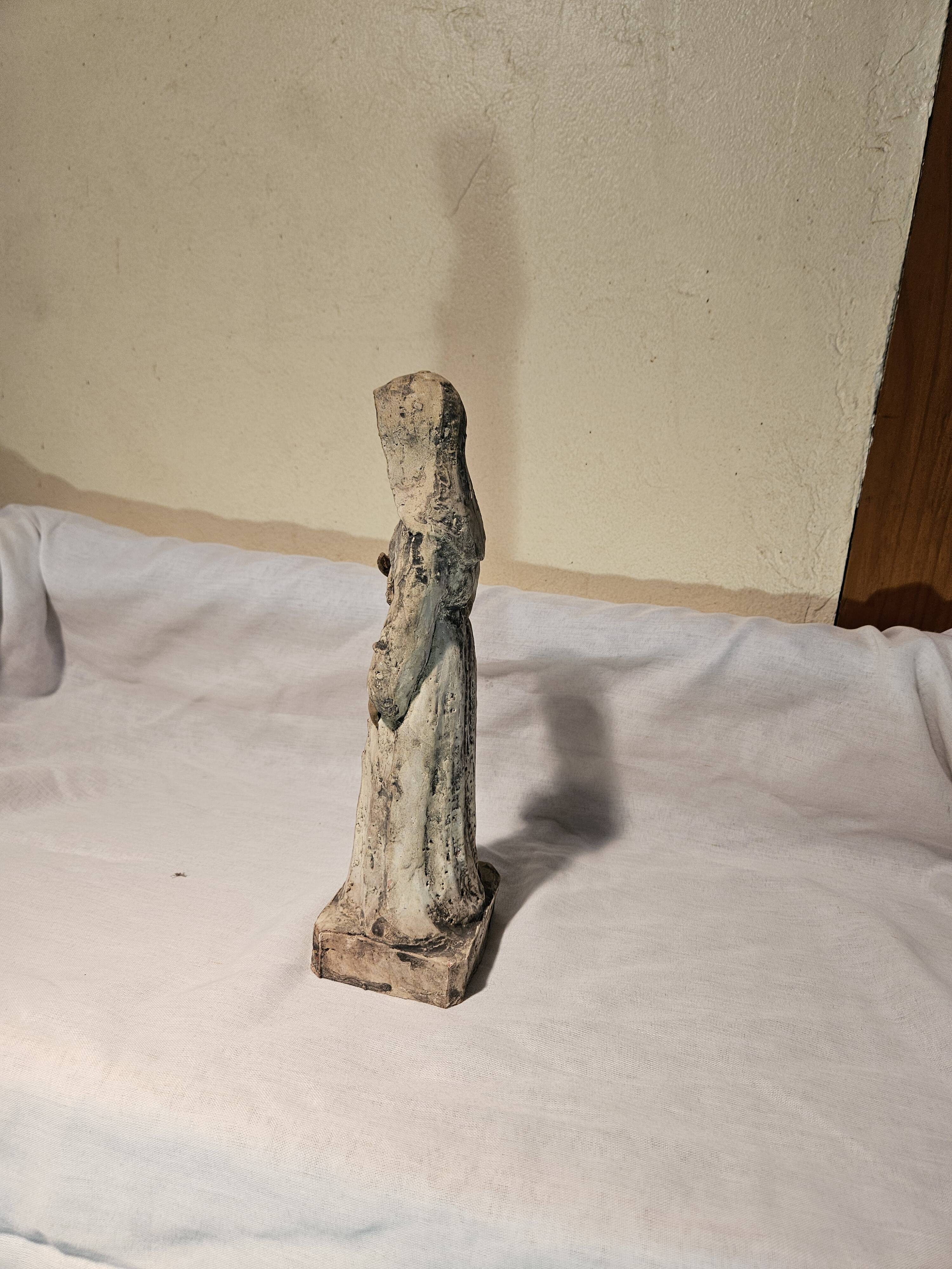 Painted terracotta holy virgin statue