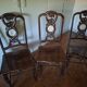 Sculpted chairs in solid wood