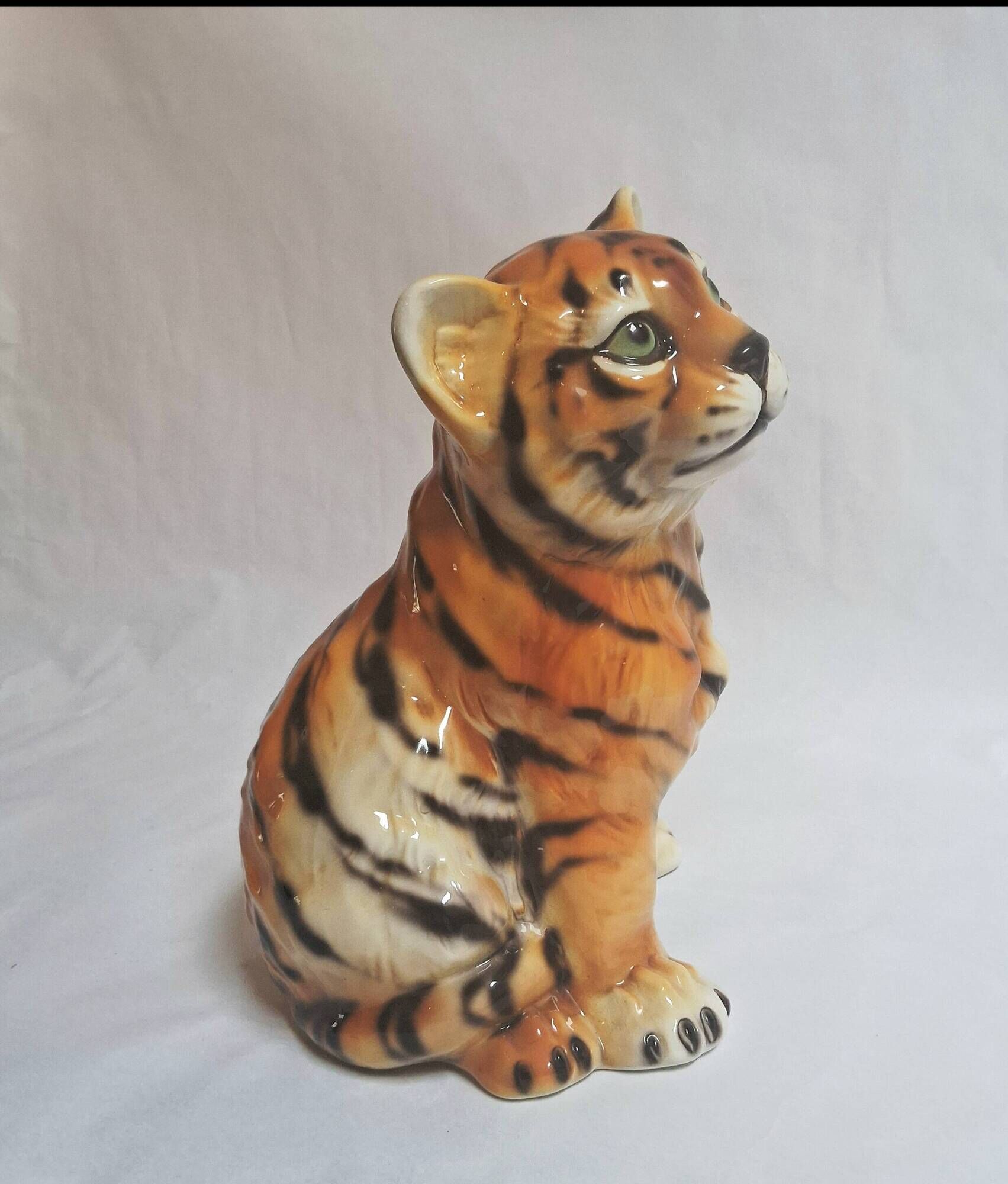 Vintage animal sculpture in Italian ceramic depicting a tiger cub.