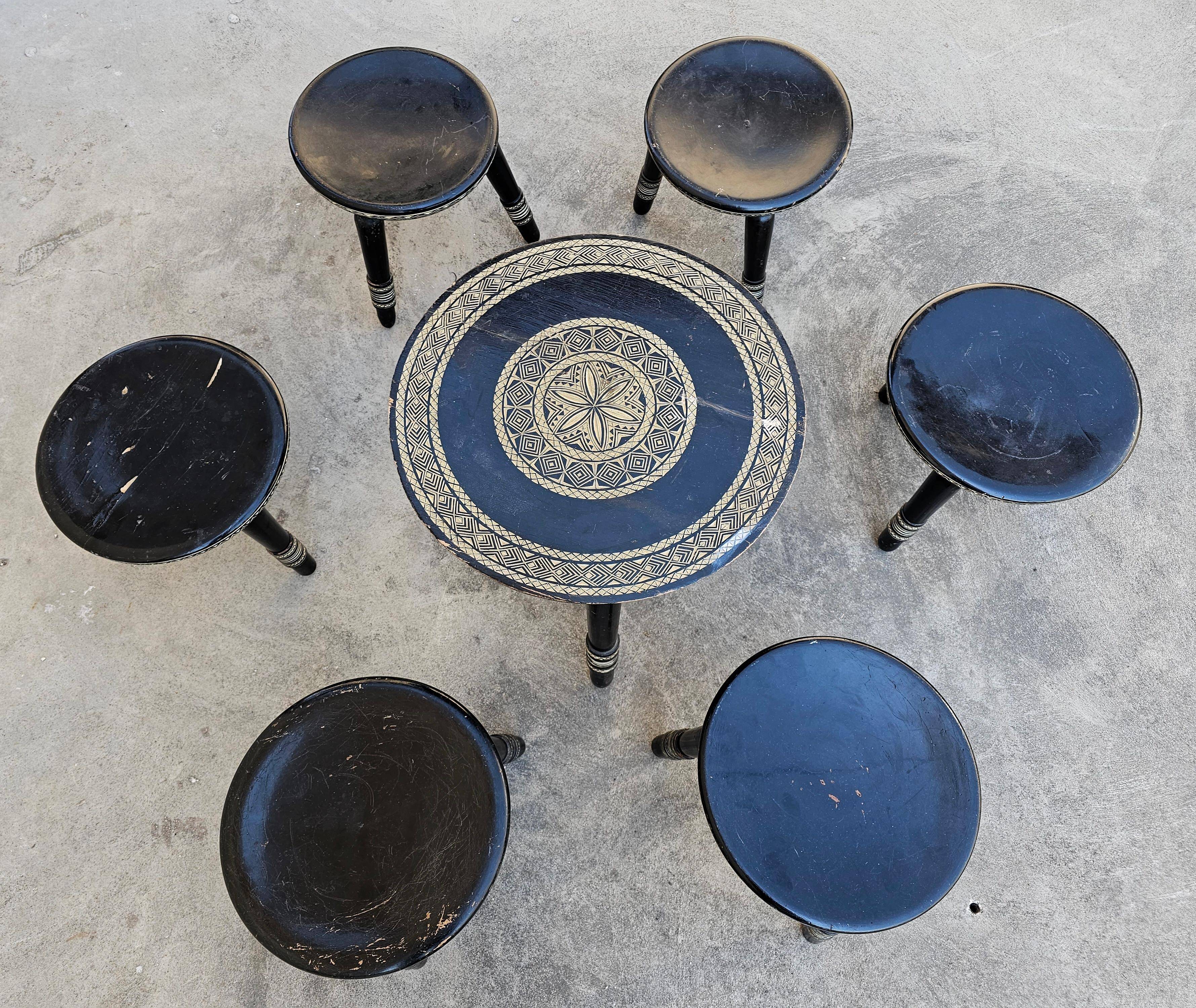 Antique hand-carved coffee table with 6 stools by Ettore Zacchari, 1900s.