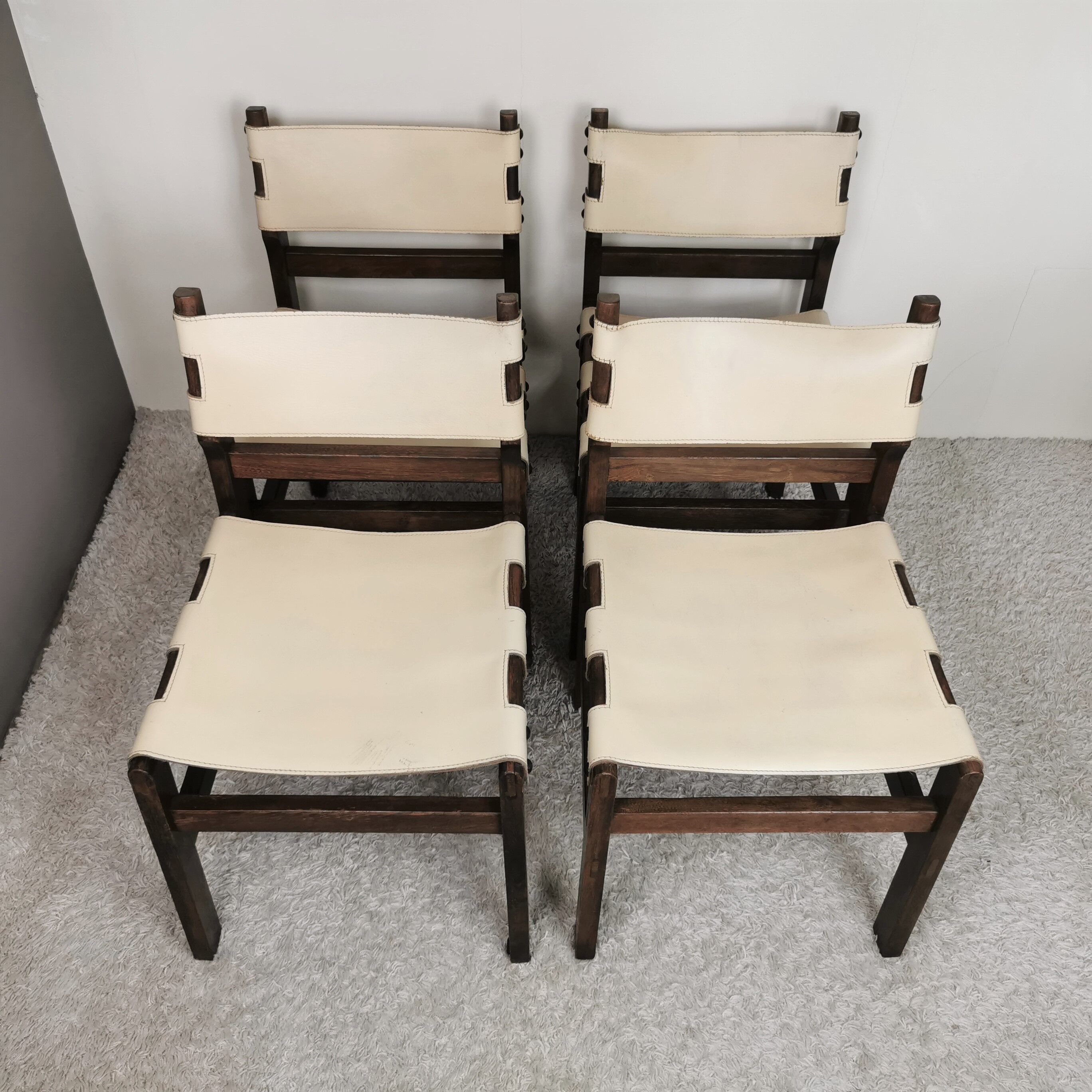 Series of 4 wooden and leather chairs