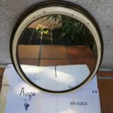 Old oval guilloche mirror, gilded and painted