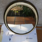Ancien miroir ovale guilloché doré et peint