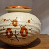 Flowering pottery vase