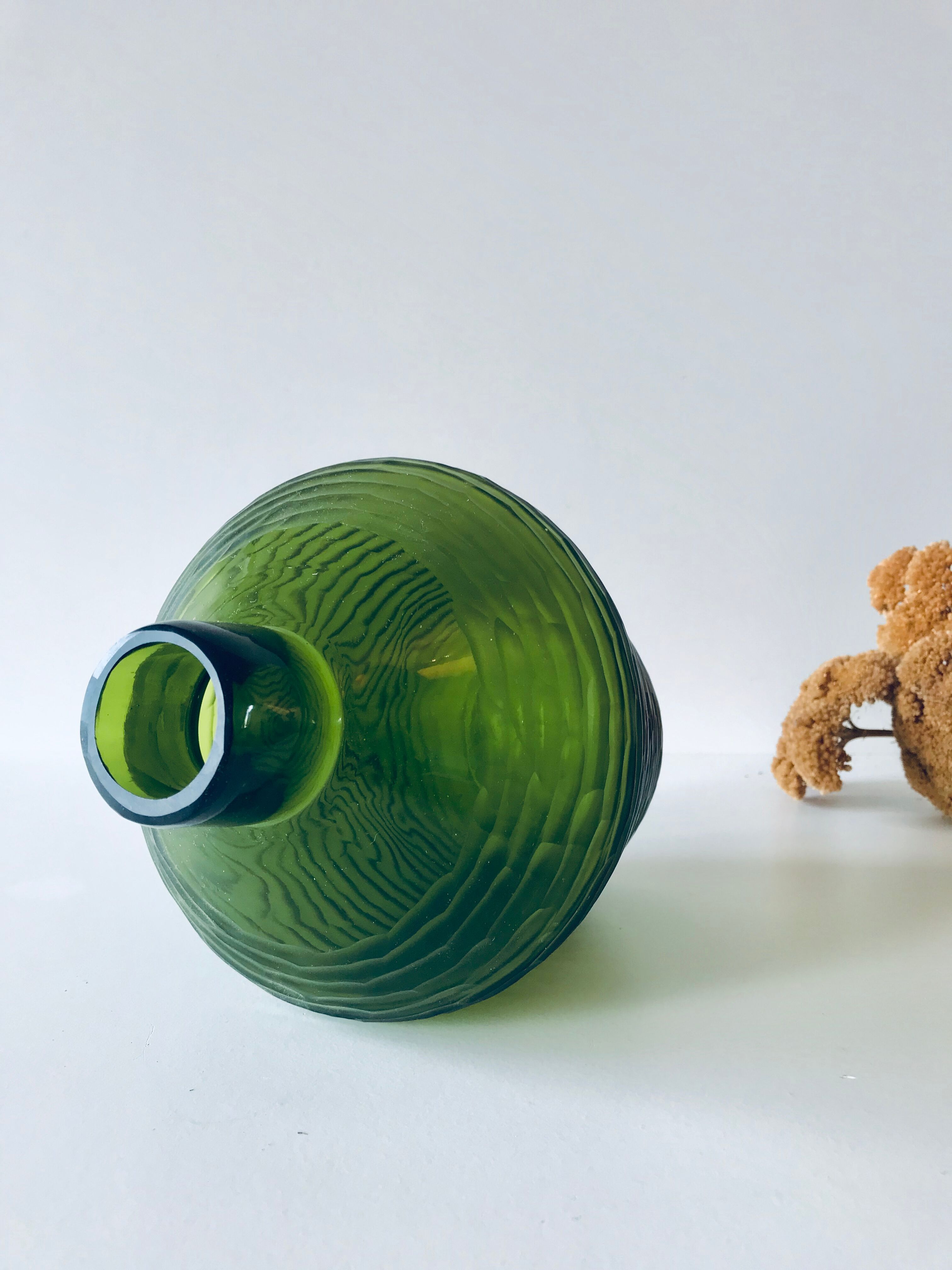 Green carved glass vase