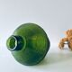 Green carved glass vase