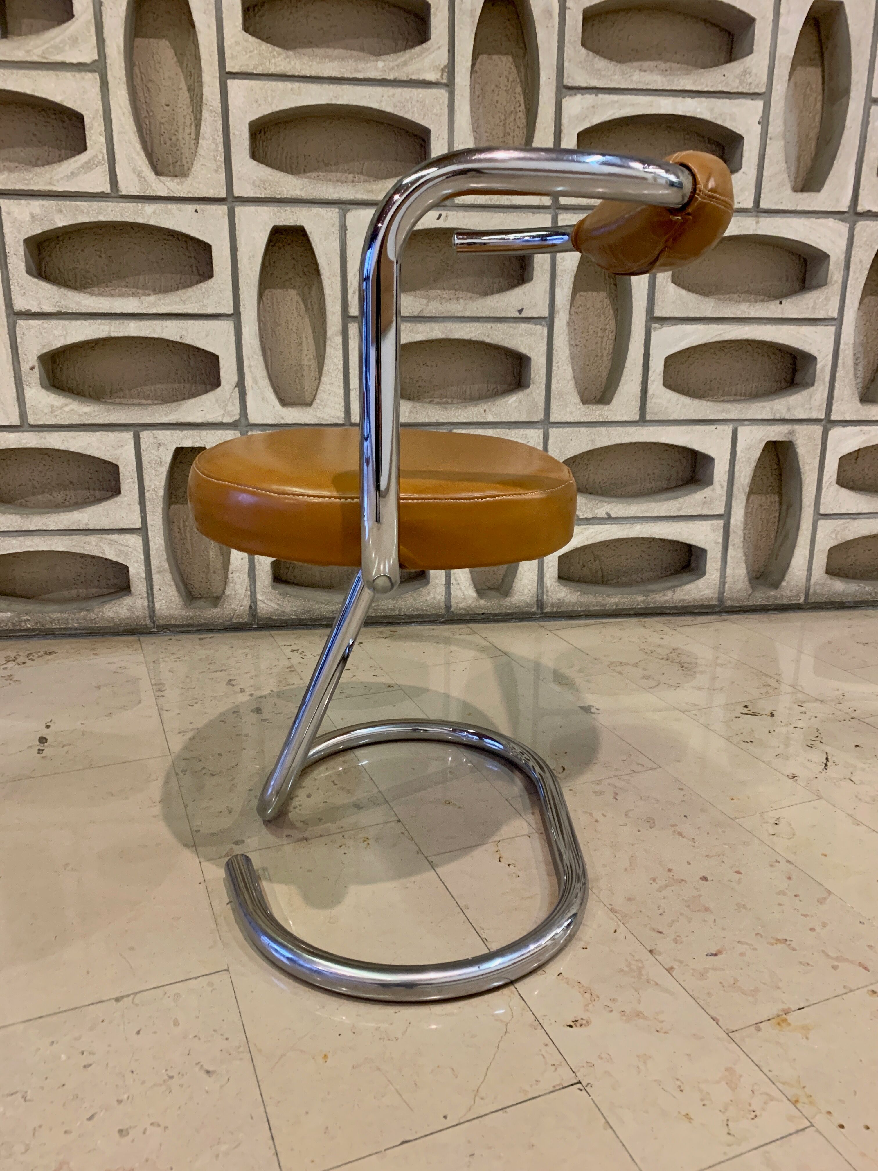 Pair of Cobra chairs by Giotto Stoppino with new leather