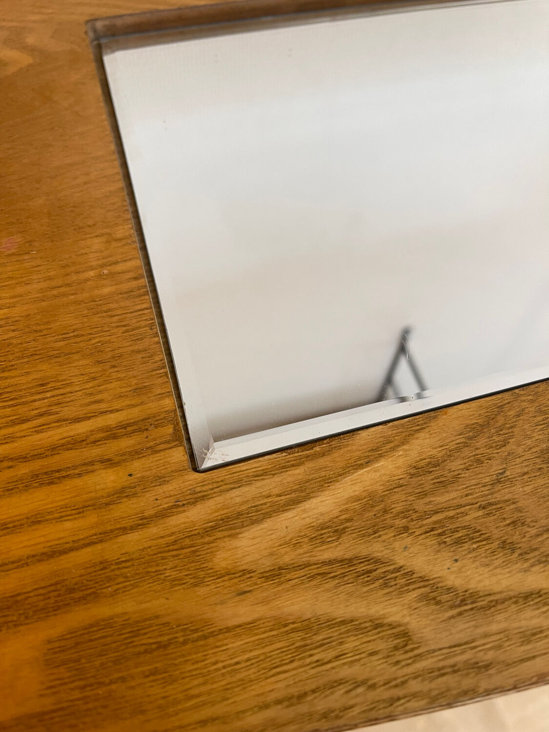 Small contemporary console in stained walnut wood.