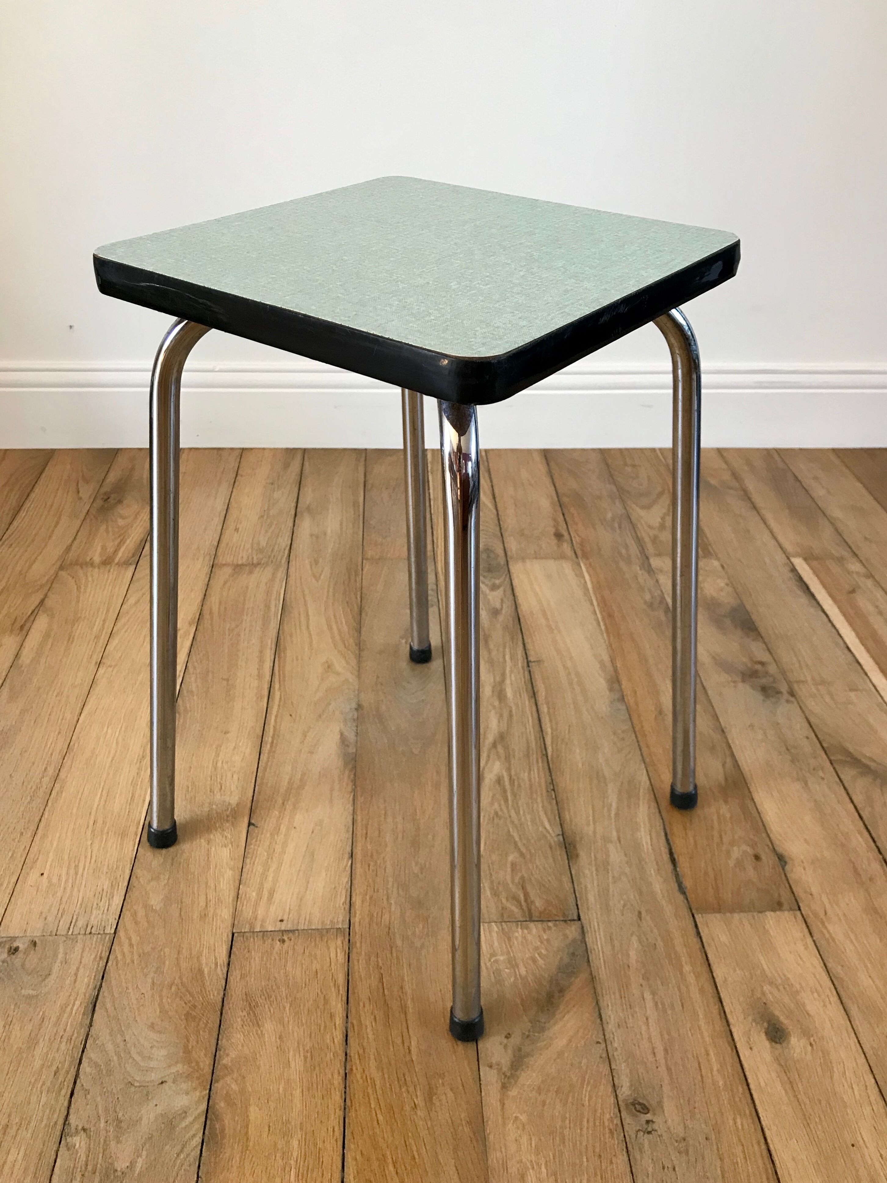 Green stool in formica 70s
