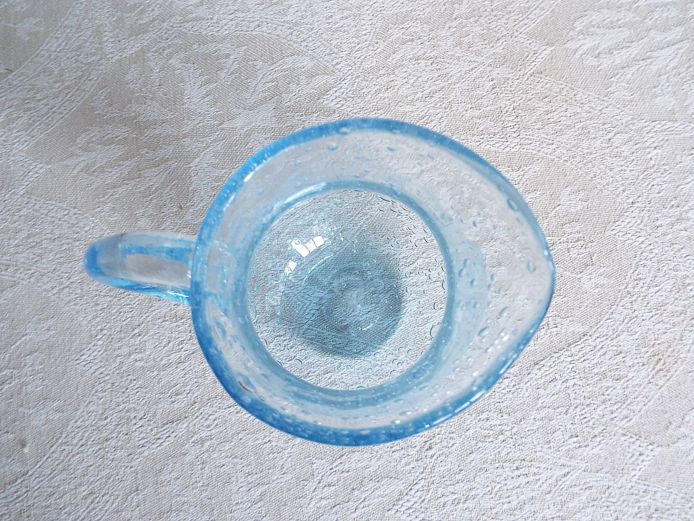 Bulled glass pitcher