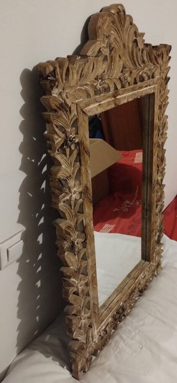 Miroir avec son cadre ajouré