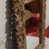 Mirror with its openwork frame