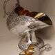 Sugar and sugar shovel in golden silver metal