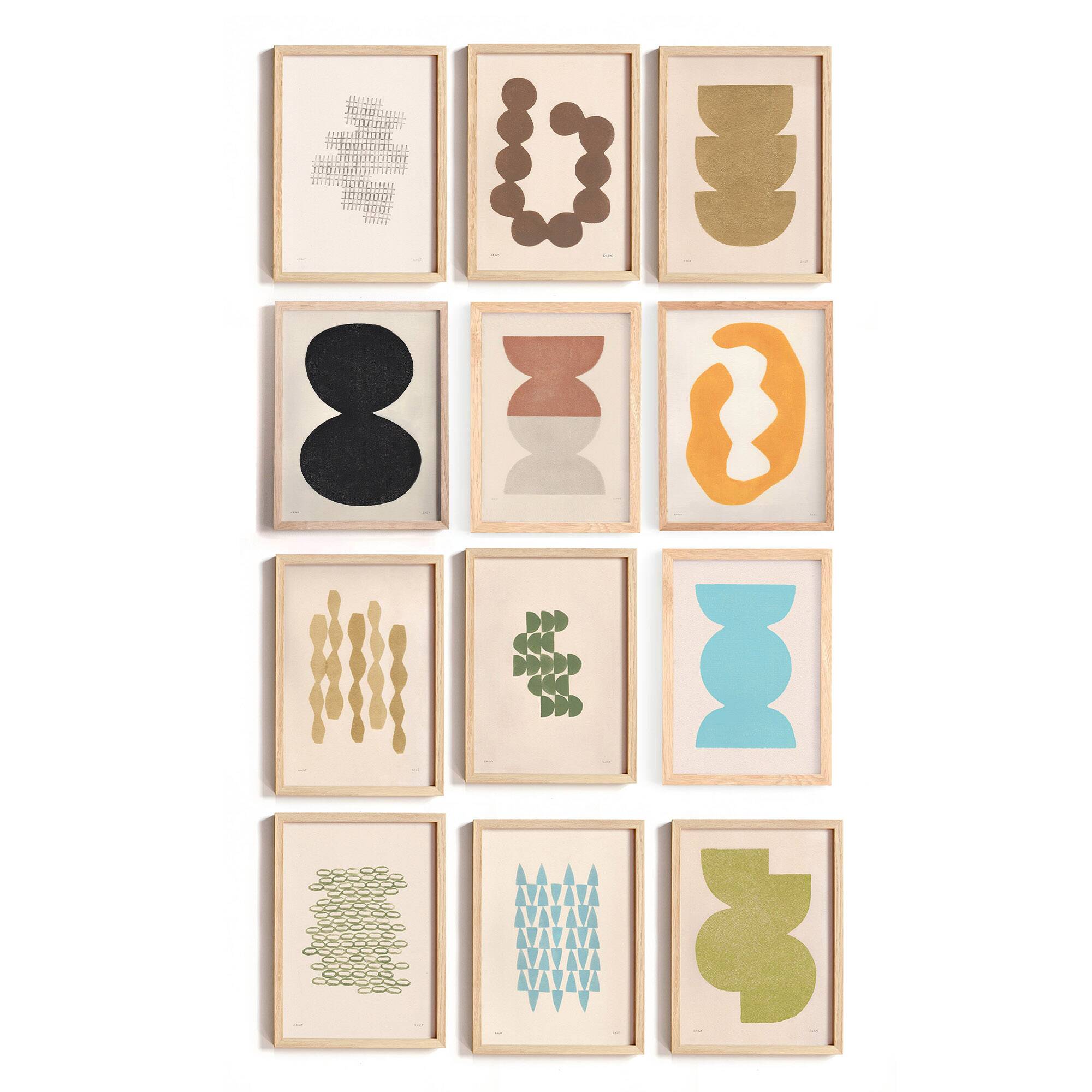 Collection of 12 framed paintings in warm/cool colours.