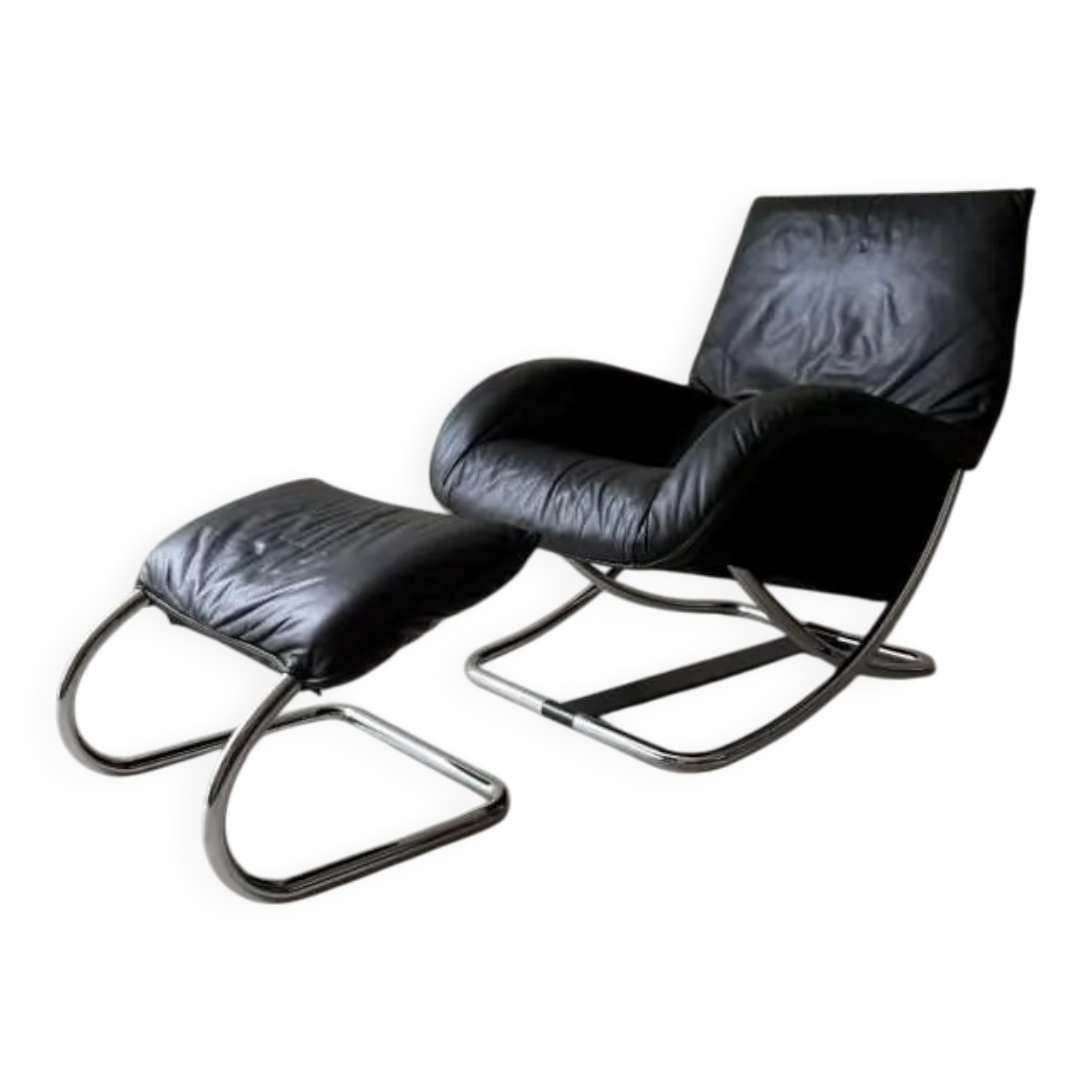 Swiss lounge chair with ottoman by Robert Haussmann from the 1980s.