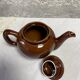 Brown glazed ceramic teapot