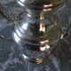 Empire-style silver metal teapot.