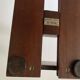 Adjustable bookend 1900 EM.Terquem, wood and brass